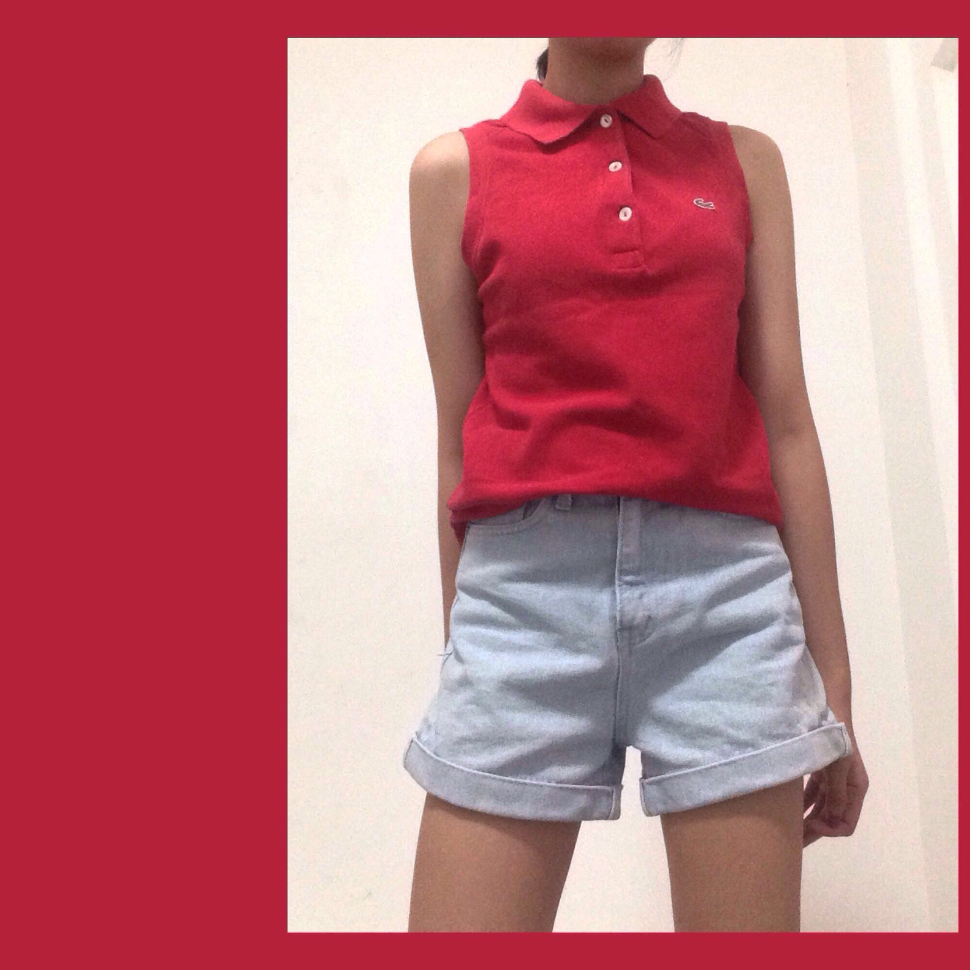 red sleeveless polo shirt