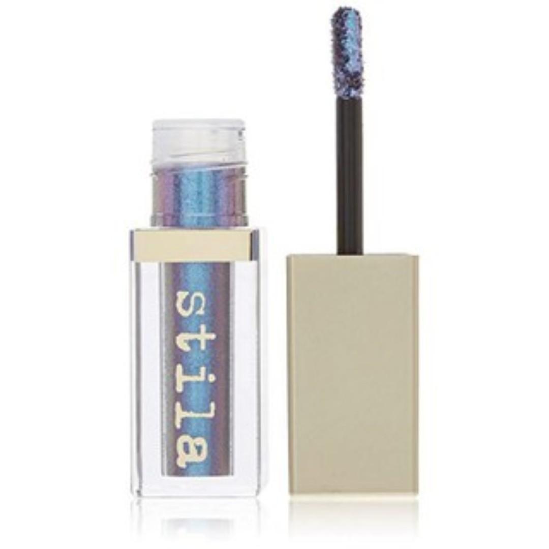 Stila Glitter & Glow Liquid Eyeshadow Into The Blue (Category: Makeup) located in Manila. Submitted by memorylanestore (Listing ID 227043323, Image 1). Description: Product Description Description A shimmering liquid eyeshadow. Perfect for layering or wearing alone, Magnificent Metals Shimmer & Glow Liquid Eye Shadow delivers high-pigment colour with a bold shimmer. Formulated without glitter pieces, this smooth translucent base is packed with pe