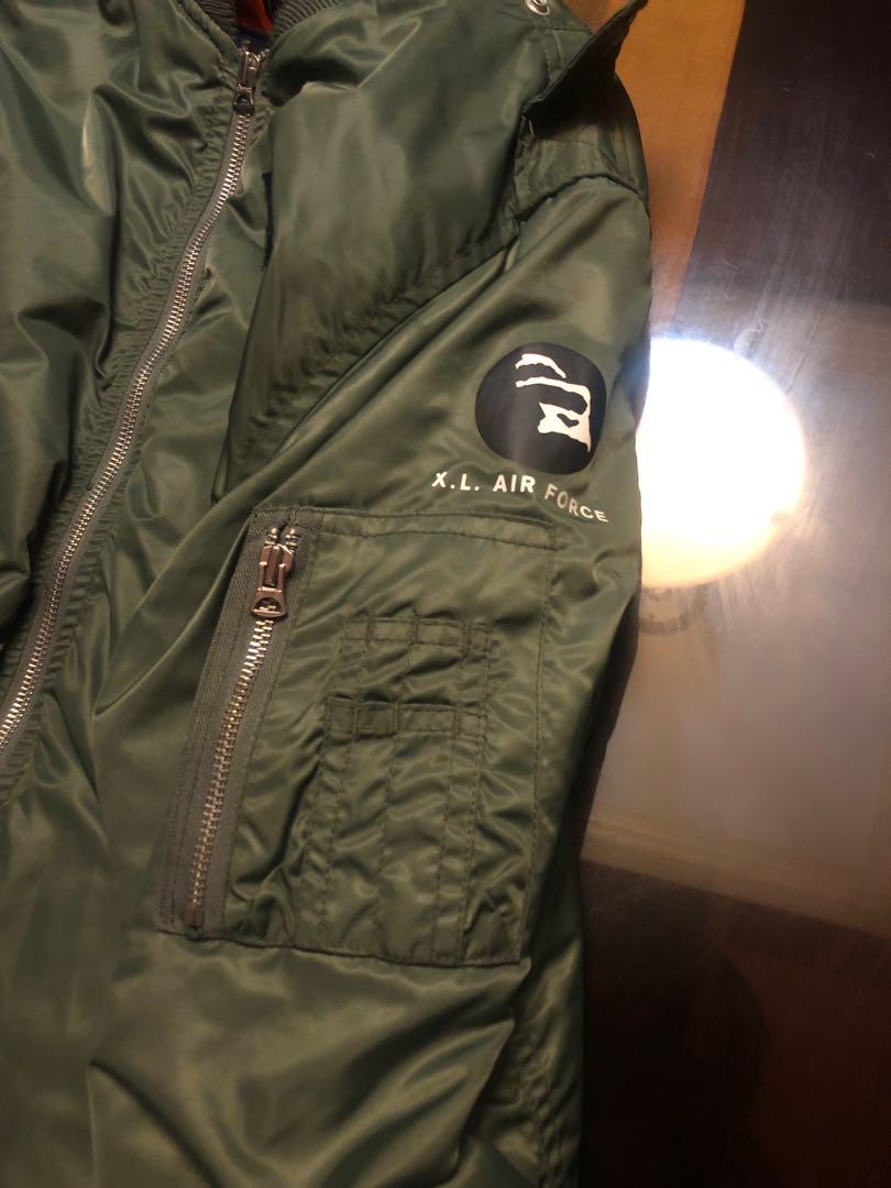 X-Large Olive Bomber Jacket (Category: Hoodies) located in Manila. Submitted by decluttuhhh (Listing ID 226972604, Image 2). Description: X-Large Olive Bomber Jacket Fits L-Xl Superb quality Subtle side sleeve decal With Patch Orange inner 3500php.
