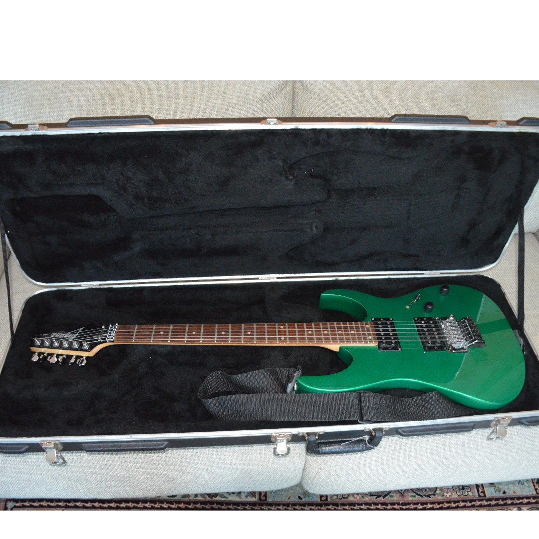Emerald Green Ibanez RG 220 guitar with hard case and strap