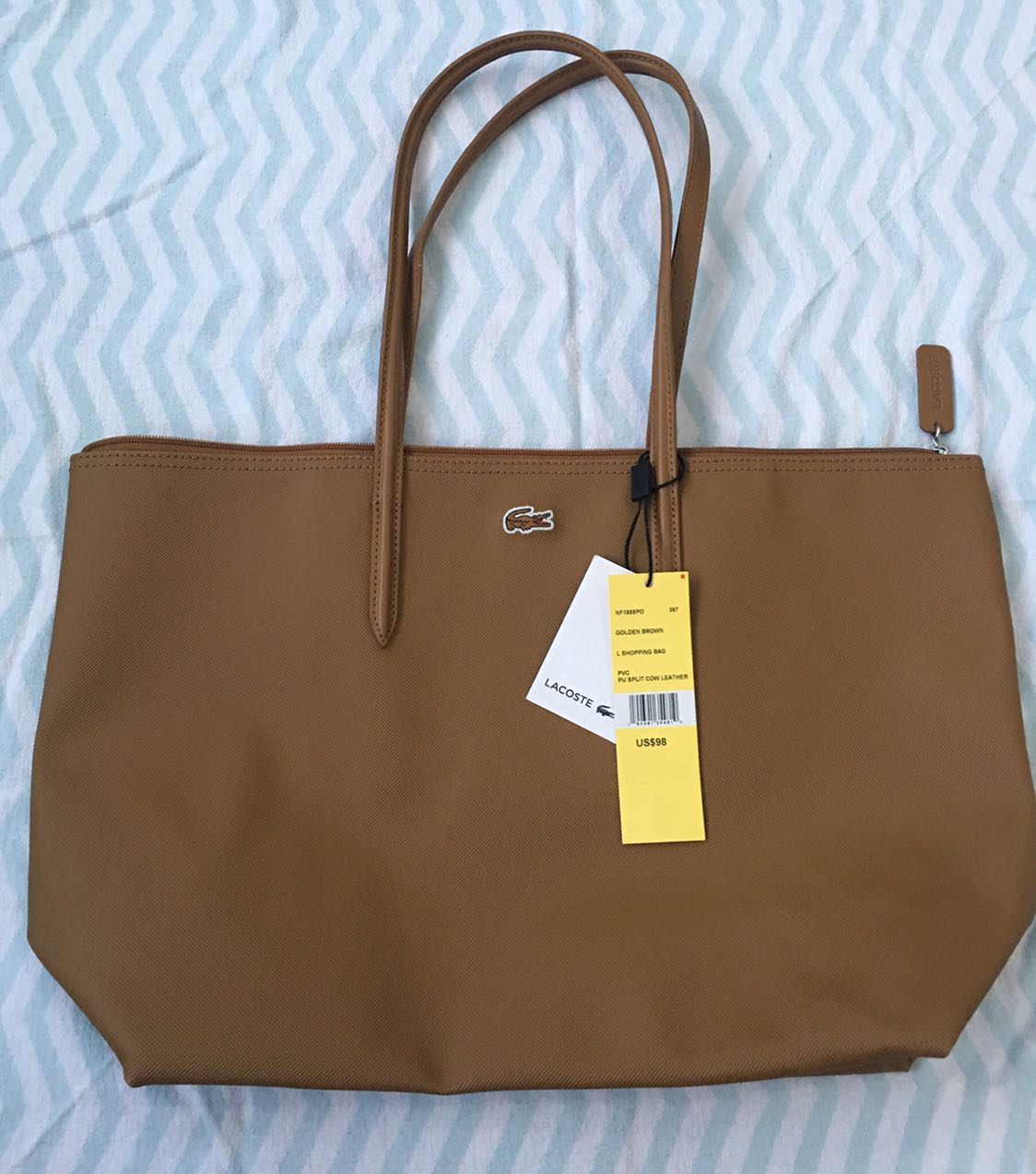 Brown bag lacoste clearance