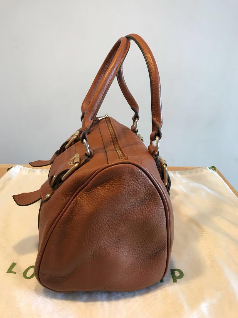 Longchamp Brown Leather Bag (Category: Bags & Wallets) located in Singapore. Submitted by kylie_w (Listing ID 156784358, Image 2). Description: Preloved 100% authentic Condition - 8.5/10 Not for fussy buyers.