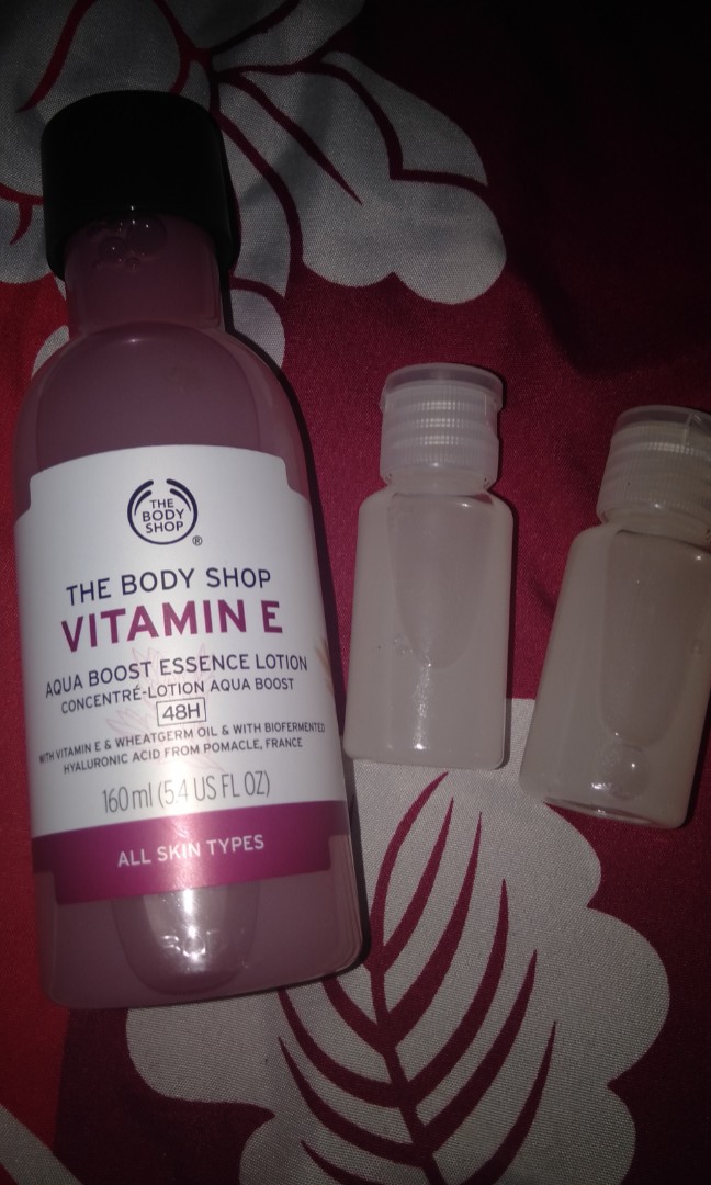 The Body Shop Vitamin E aqua boost essence lotion share in bottle 30ml