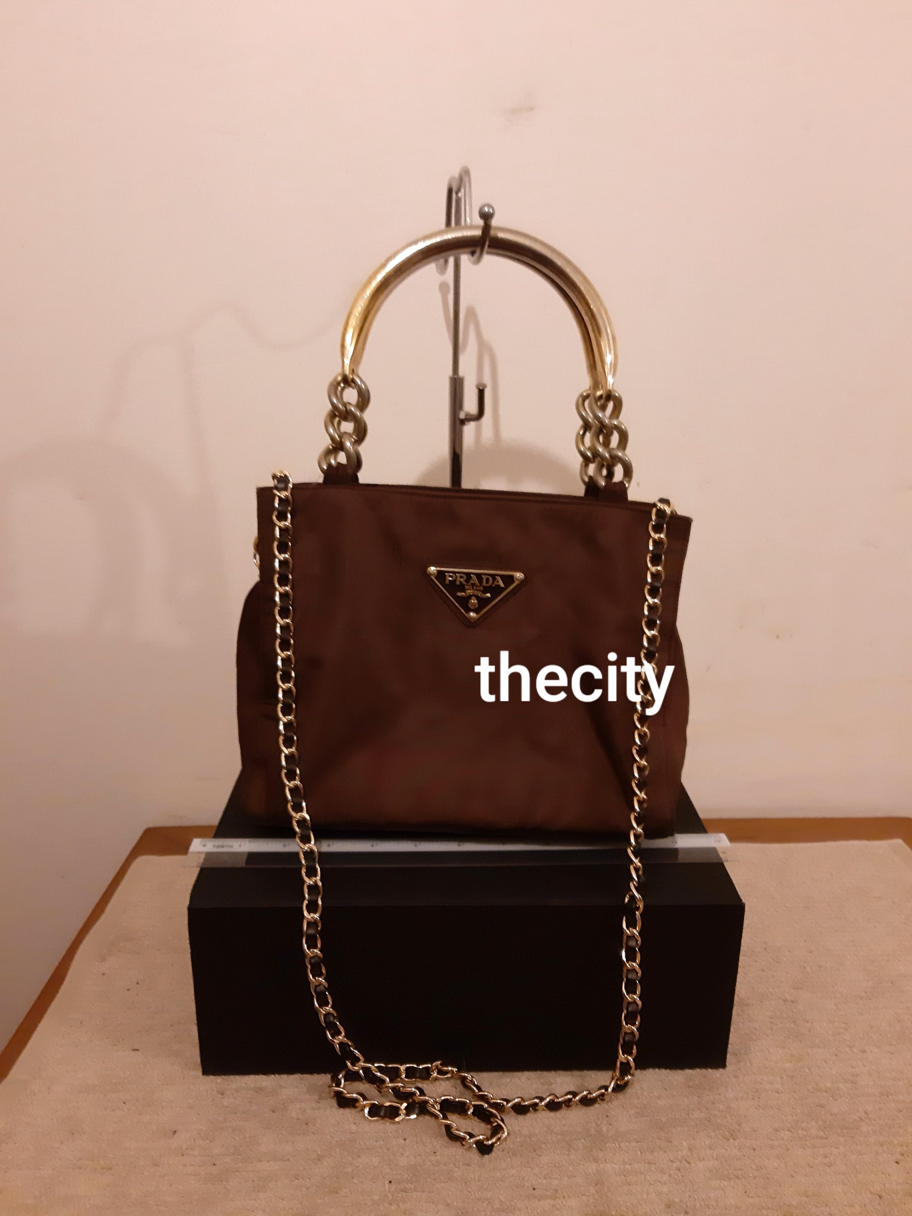 How to clean best sale prada canvas bag