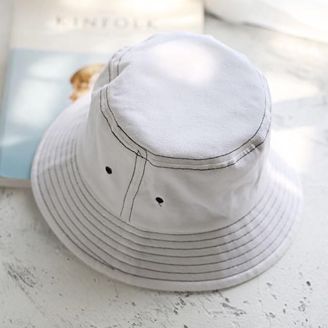 white browns bucket hat