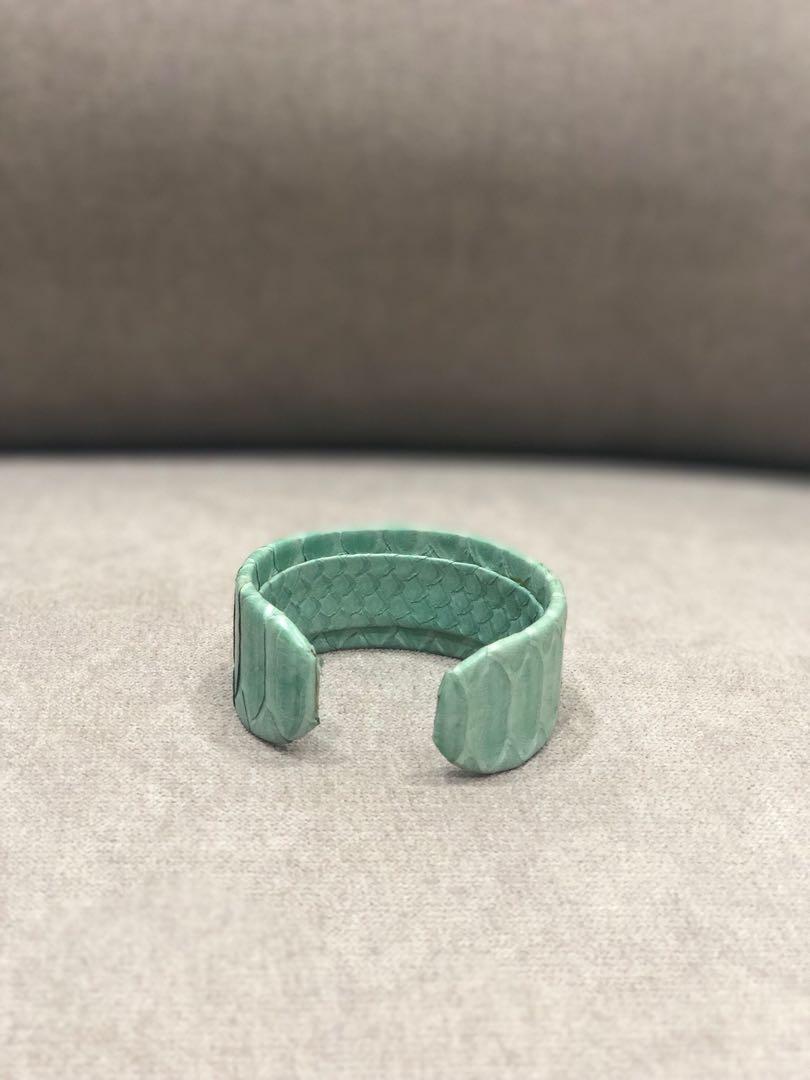 Mint green python-skin bangle (Category: Precious Stones) located in Singapore. Submitted by lilflobowl (Listing ID 227764472, Image 2). Description: I don’t recall the brand but bought it from CK Tang department store many years ago. Lightly used but in excellent condition. Pictures taken at time of listing..