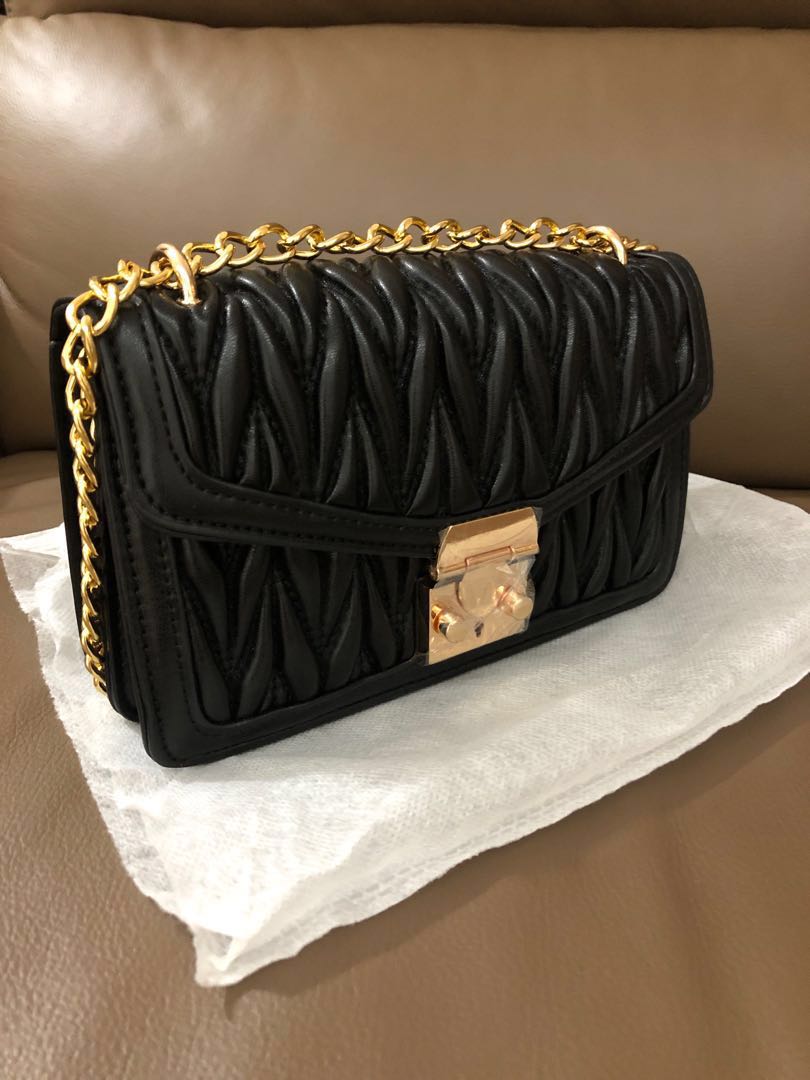 INSPIRED MIU MIU SLING BAG