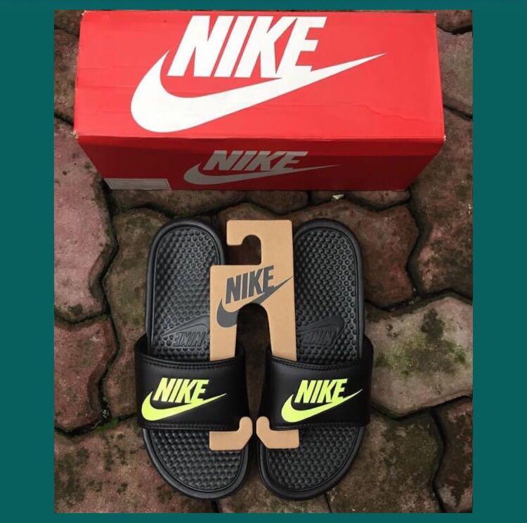 nike benassi slides yellow