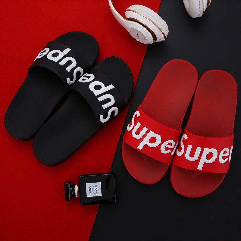 supreme flip flops red