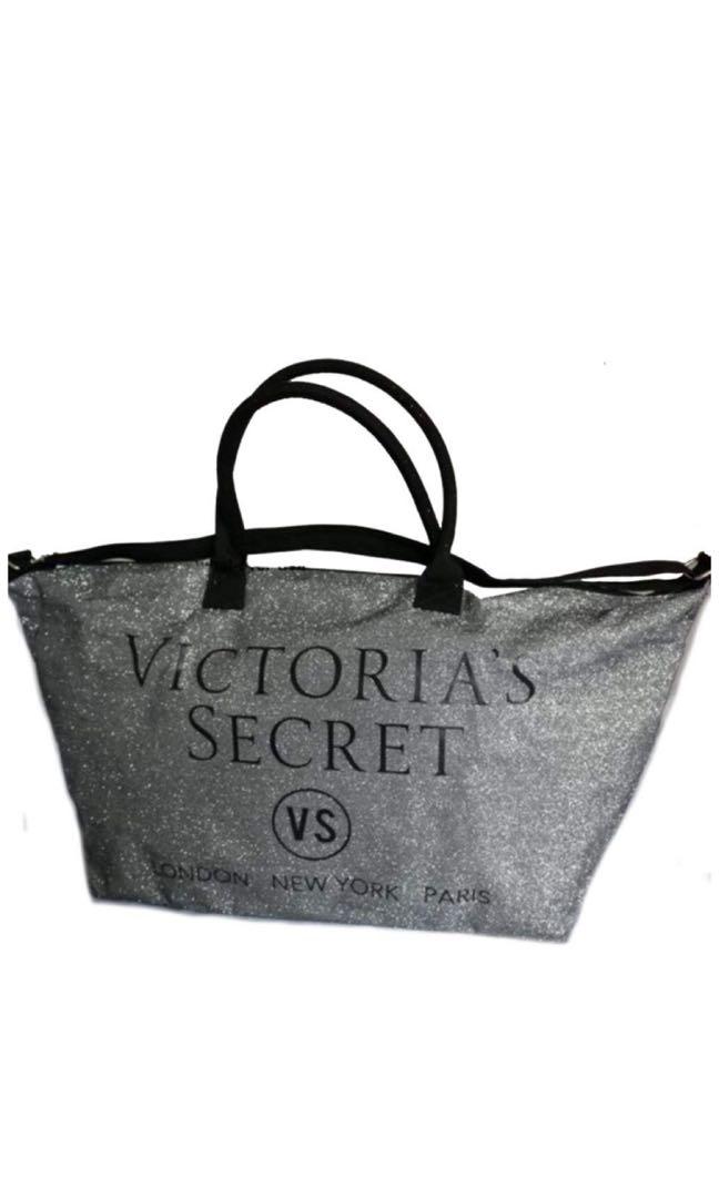 VS Silver Glitter Tote Weekender [Limited Edition] (Category: Luxury Bags & Wallets) located in Pasig City. Submitted by seeril (Listing ID 227872715, Image 2). Description: Size: Extra Large Measures: 24" L x 7" W x 14.5" H Color: Silver glitter Zip Top | Shoulder Strap | Top Handles.