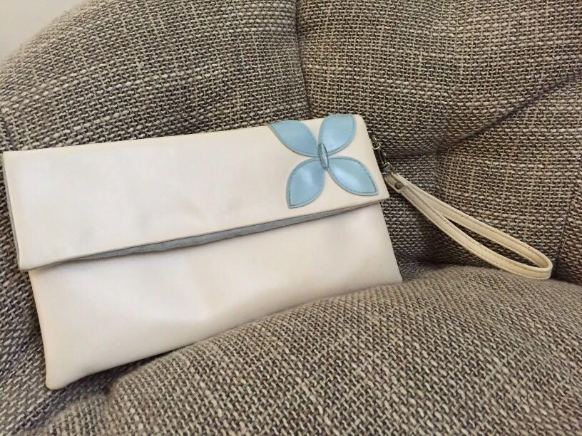 pastel blue clutch bag