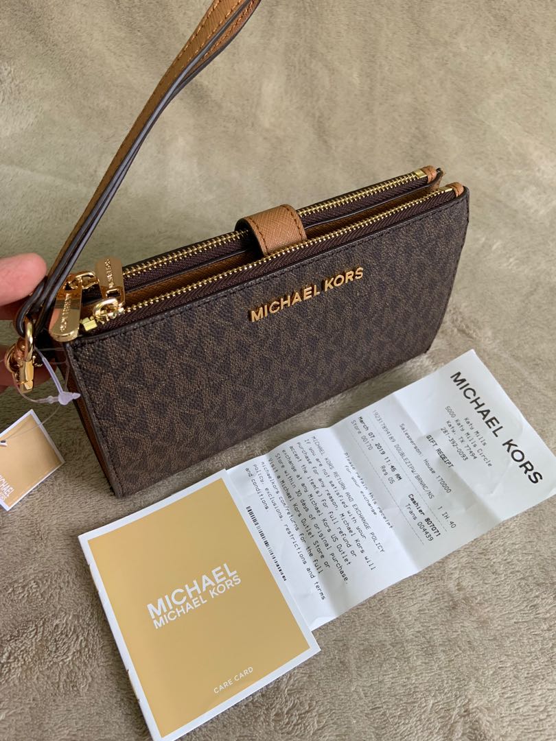 ?% Authentic Michael Kors Double Zip Wristlet, Women's Fashion, Bags &  Wallets, Wallets & Card holders on Carousell