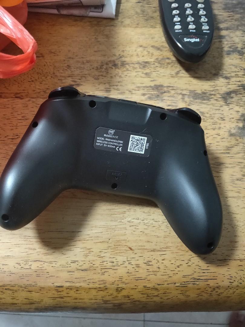 3rd party switch controller (Category: Nintendo) located in Singapore. Submitted by icysoul (Listing ID 228258682, Image 2). Description: Used for few times. Condition 10/10 No problems. No box. Interested can just pm me or WhatsApp me at 83799124..