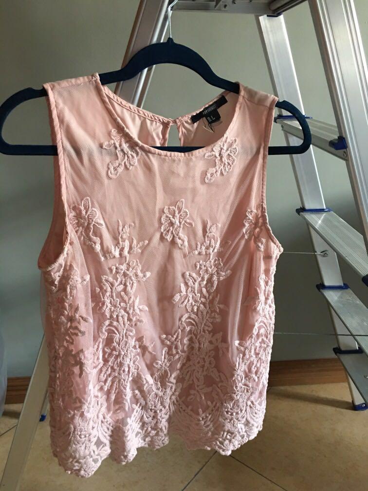 Blush lace sleeveless top (Category: Sleeveless) located in Antipolo. Submitted by projectc (Listing ID 228186172, Image 1). Description: Decluttering Last price posted.