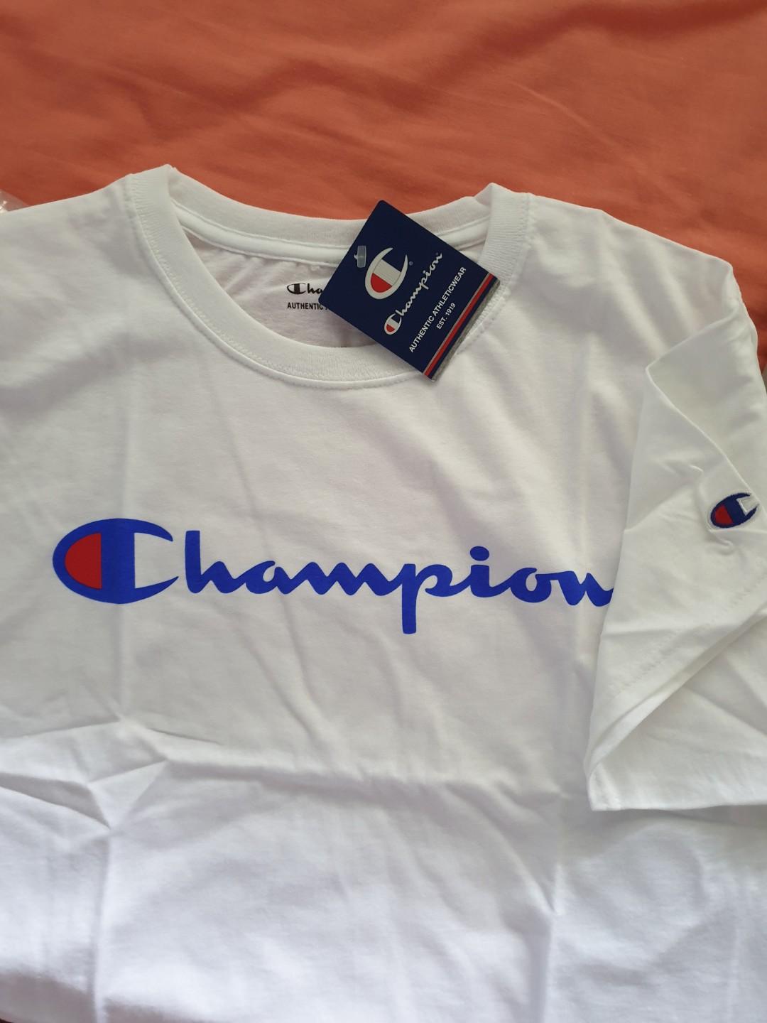 navy blue and white champion shirt