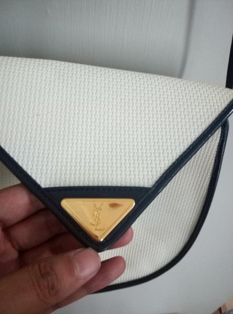 YSL Vintage Sling Bag (Category: Luxury Bags & Wallets) located in Makati City. Submitted by superflyangel (Listing ID 228381124, Image 3). Description: 1980s/90s Design Outside and inside material are in good condition Slight damage but repairable (see last two photos) The little side of the flap has cracked where the bag opens and closes Last price posted (5.5k) Shipping not included.