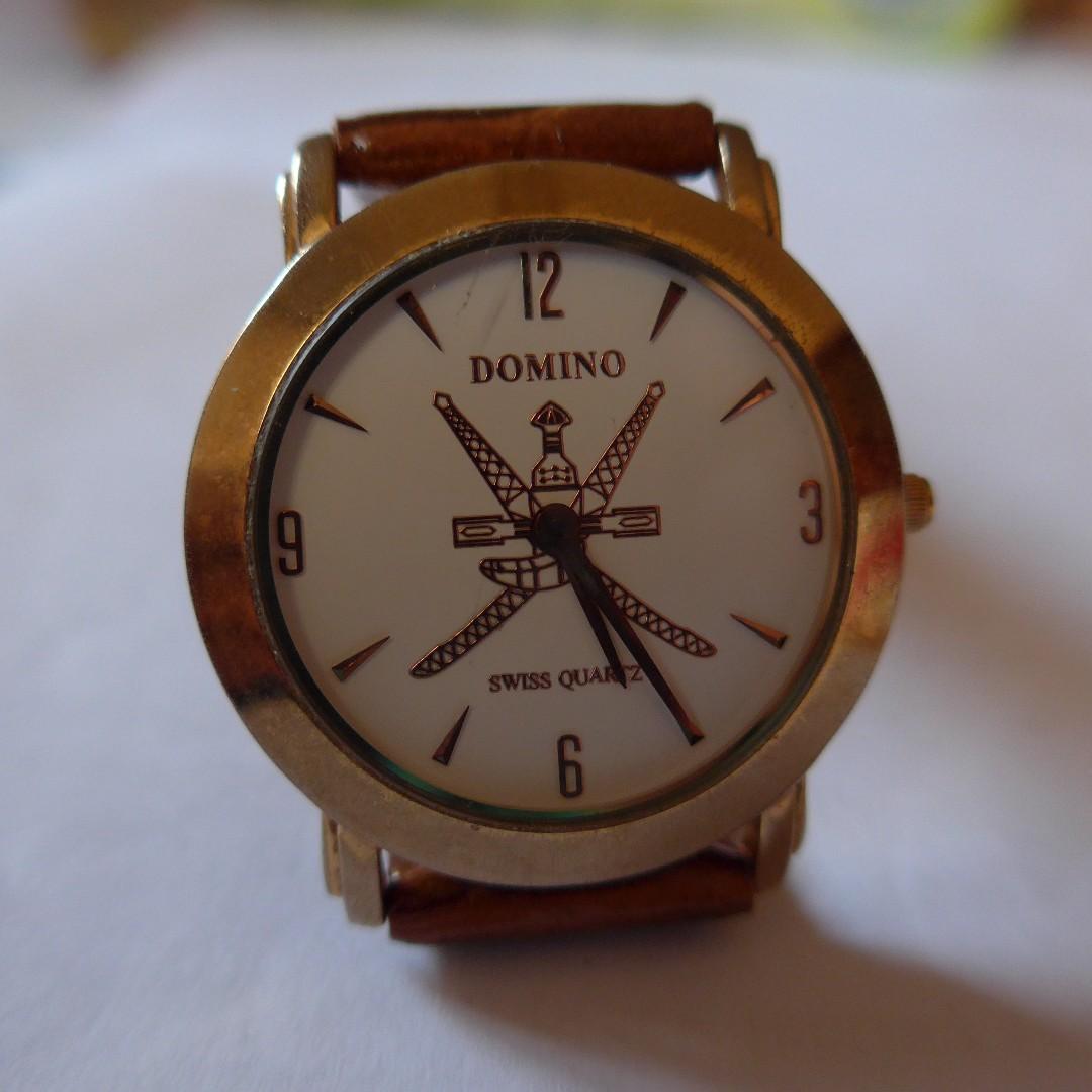 Domino watch on sale 22k gold