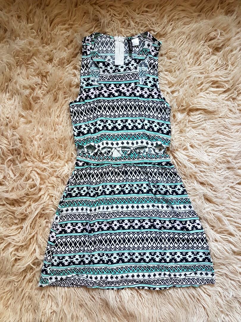 H&M Aztec Dress (Category: Dresses) located in Mandaluyong City. Submitted by somethingoldmnl (Listing ID 228560457, Image 1). Description: Pre-loved RFS: Decluttering - No issues - Used once Details: with front cut-out at the shoulders & waist.