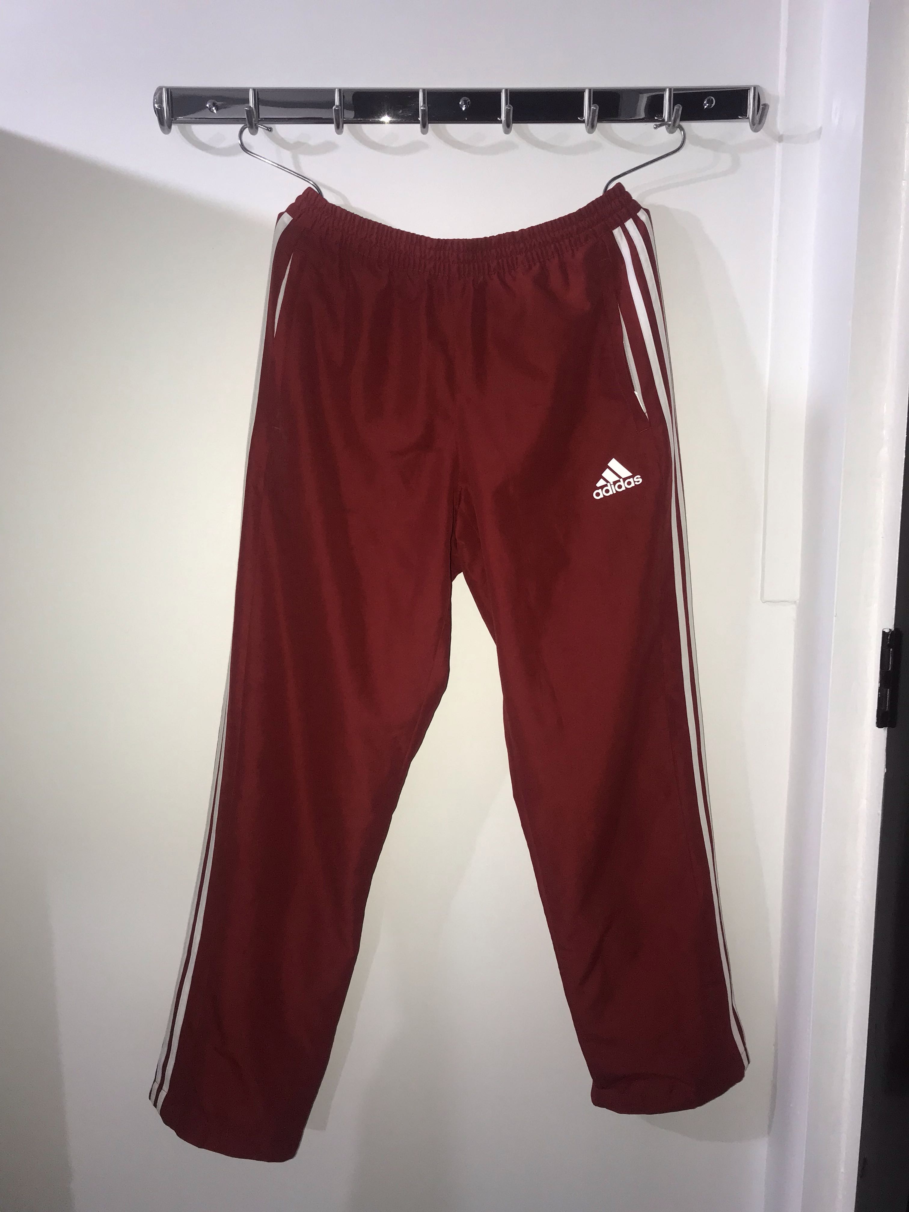 red adidas track pants