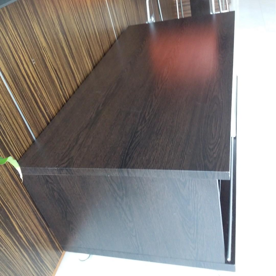 Solid Wood Console Table (Category: Tables & Sets) located in Singapore. Submitted by temasekfi.com (Listing ID 228574818, Image 2). Description: This is a solid wood console table with sliding glass door. it is about 2 years old and very underused. No visible damages. Dimension : Length = 121 cm , Depth = 61cm , Height = 51cm ..