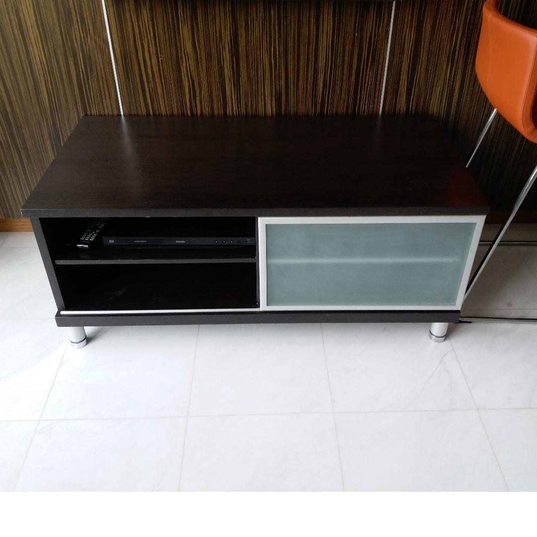 Solid Wood Console Table (Category: Tables & Sets) located in Singapore. Submitted by temasekfi.com (Listing ID 228574818, Image 1). Description: This is a solid wood console table with sliding glass door. it is about 2 years old and very underused. No visible damages. Dimension : Length = 121 cm , Depth = 61cm , Height = 51cm ..