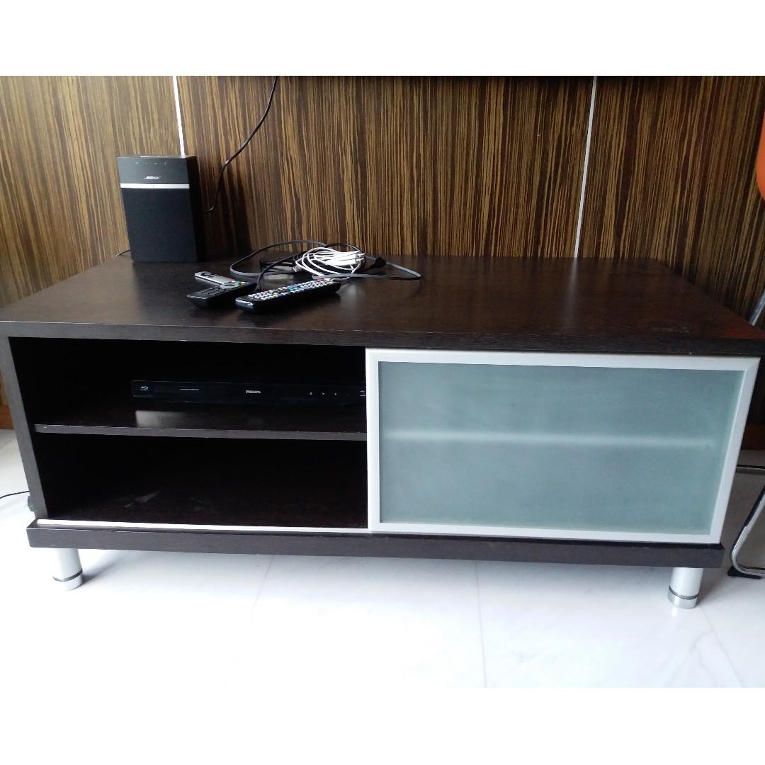 Solid Wood Console Table (Category: Tables & Sets) located in Singapore. Submitted by temasekfi.com (Listing ID 228574818, Image 3). Description: This is a solid wood console table with sliding glass door. it is about 2 years old and very underused. No visible damages. Dimension : Length = 121 cm , Depth = 61cm , Height = 51cm ..