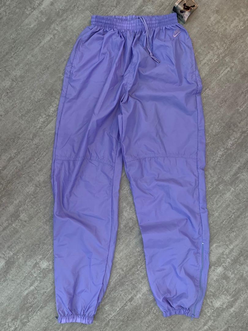 purple nike track pants