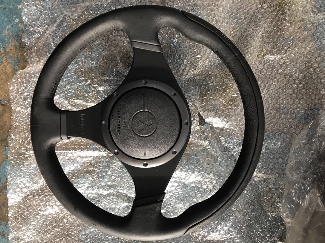 Evolution 9 steering wheel Evo 9, Car Accessories, Accessories on Carousell