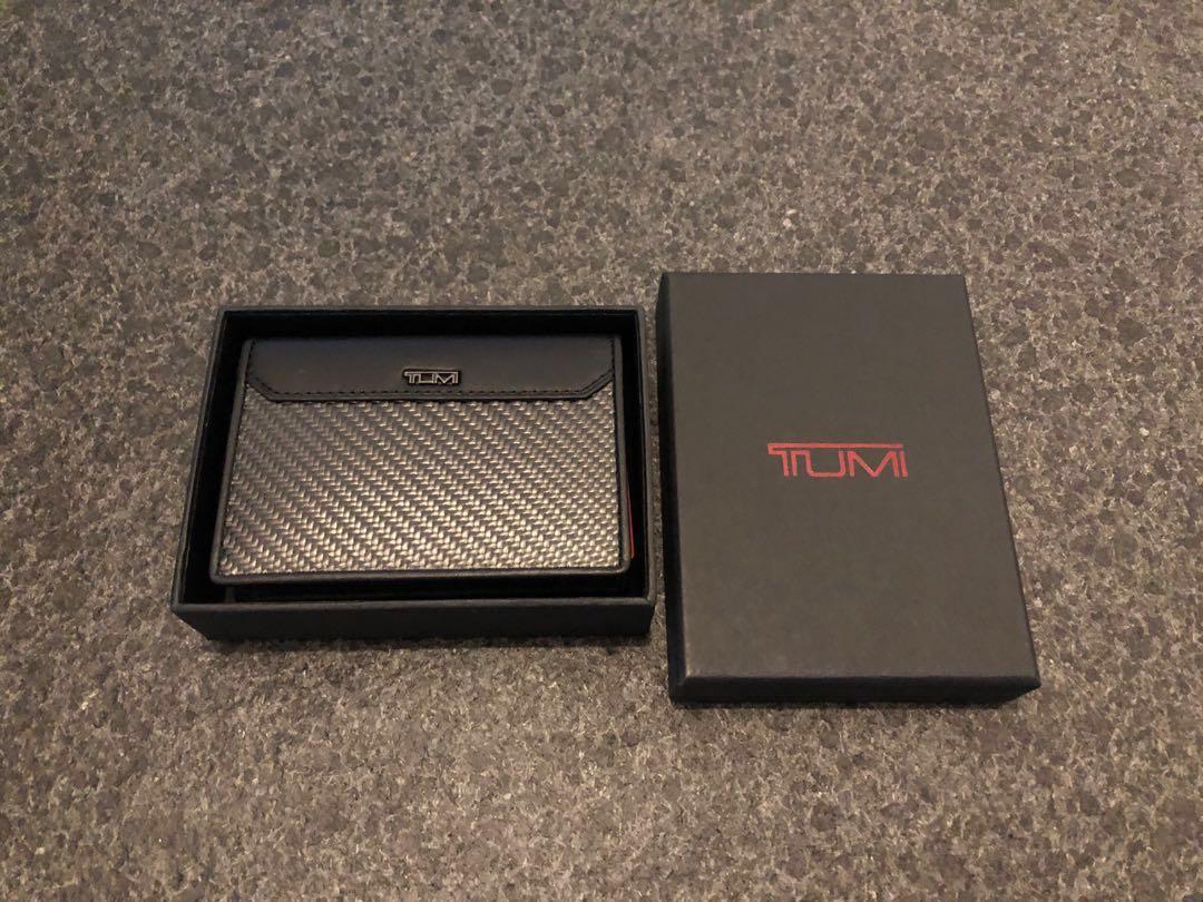 Tumi CFX carbon fiber gusseted case Men s Fashion Watches