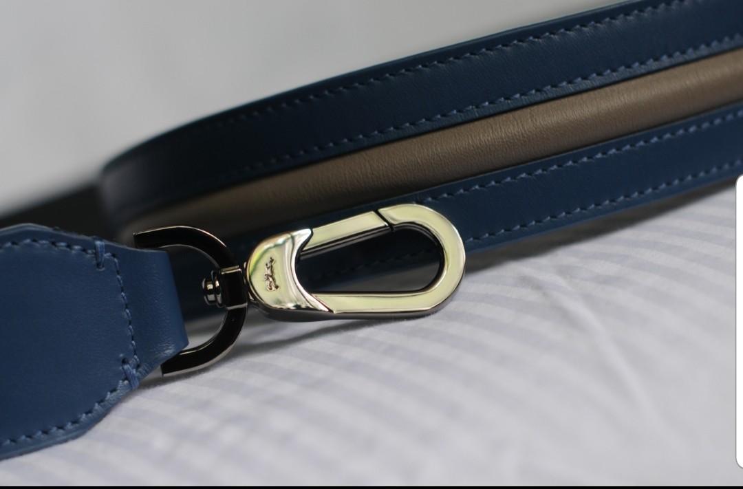 Longchamp Bag Strap (Category: Hair Accessories) located in Quezon City. Submitted by iguechi (Listing ID 228842946, Image 3). Description: Color: blue and grey Hardware: gunmetal Length including hardware: 44 in. Purchased in London Accepts bdo, bpi or metrobank payment only #carousweldo2.
