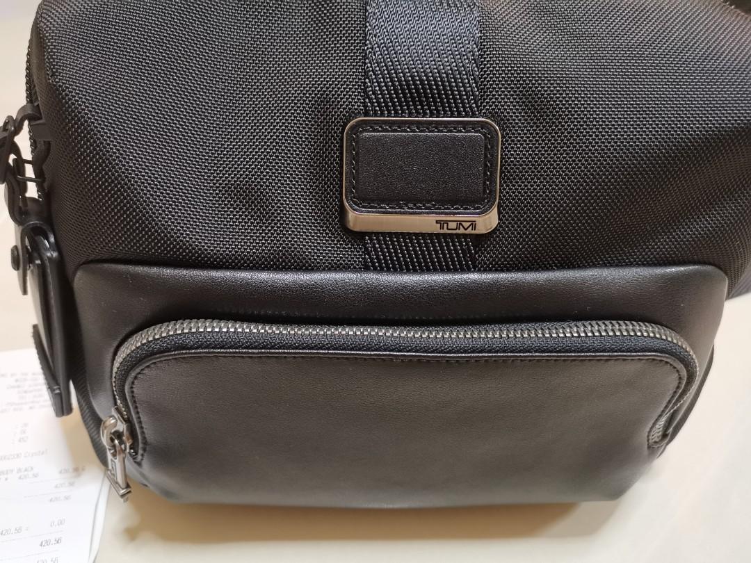 Lewis deals crossbody tumi