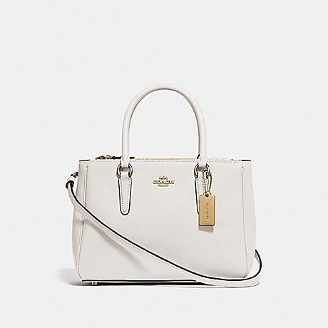 white coach clutch