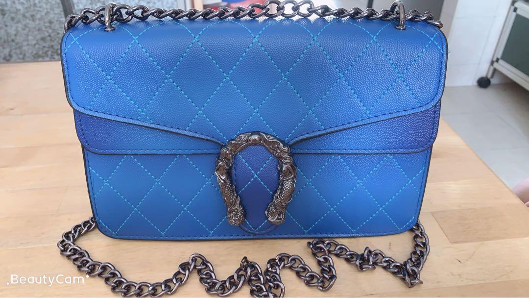 Electric blue handbags on sale