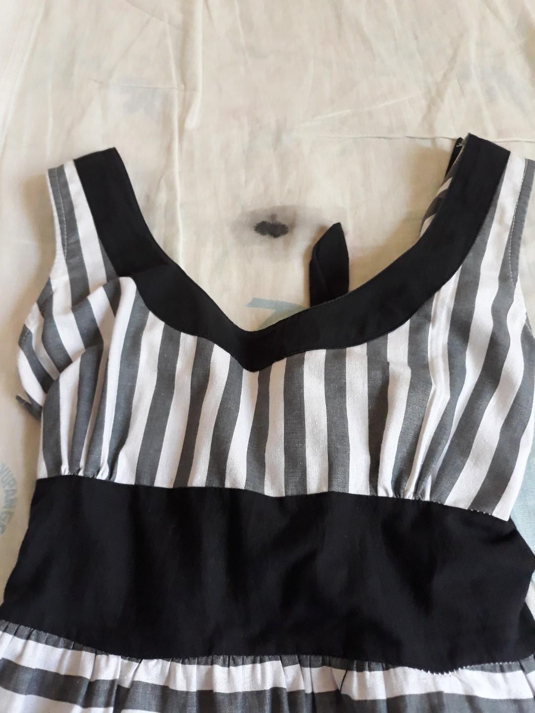 Gray and white casual stripe dress (Category: Dresses) located in Arayat. Submitted by mgf00 (Listing ID 229015318, Image 2). Description: USED TWICE Fits small - medium body size only Slightly stretchable No signs of usage 8/10 No flaw - stored only Please manage your expection as you are purchasing some preloved and some brand new but stored and has minor damage items. Thank you so much! Please be kind to the seller😊 Pm for more inquiries and 