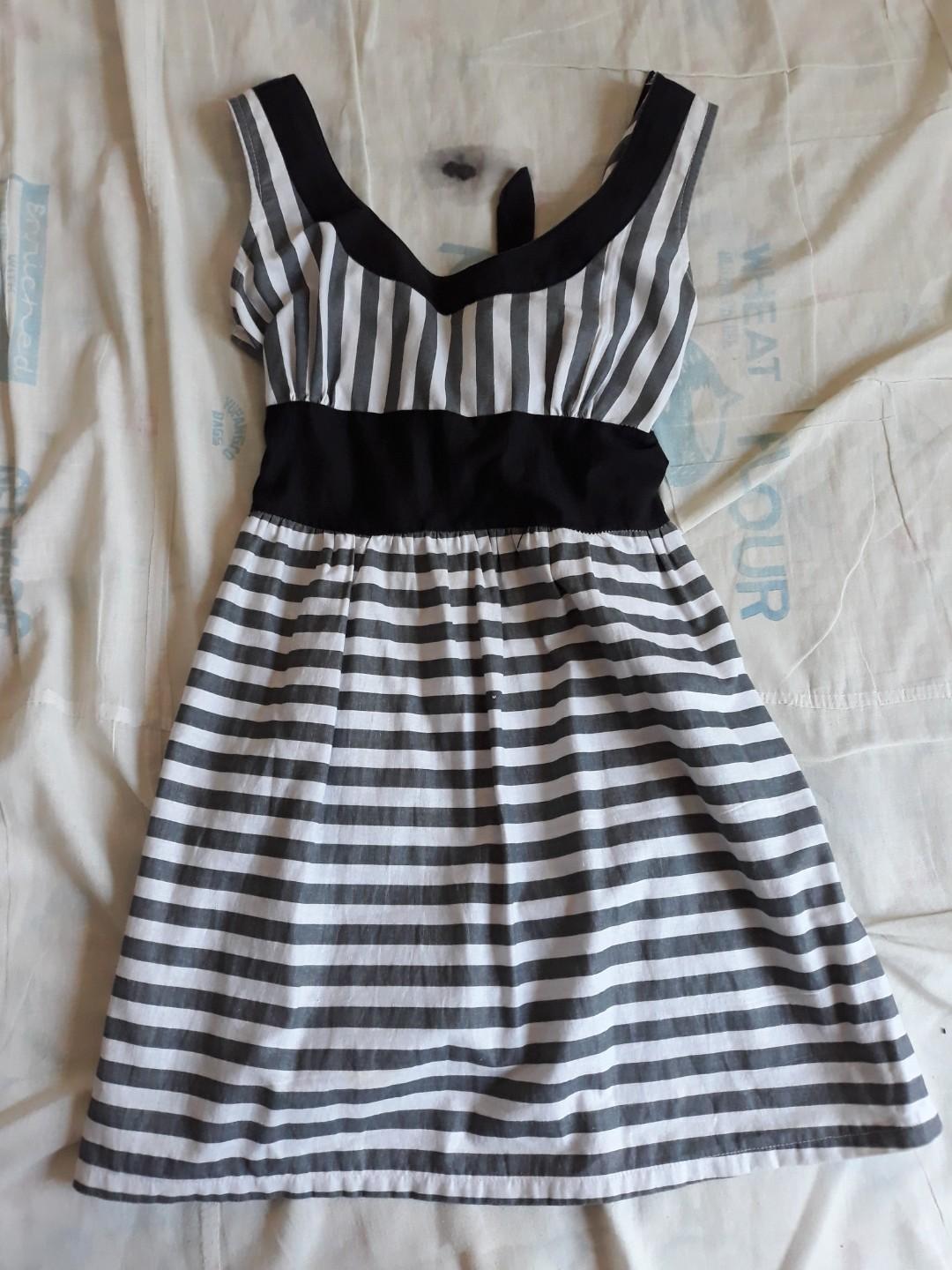 Gray and white casual stripe dress (Category: Dresses) located in Arayat. Submitted by mgf00 (Listing ID 229015318, Image 1). Description: USED TWICE Fits small - medium body size only Slightly stretchable No signs of usage 8/10 No flaw - stored only Please manage your expection as you are purchasing some preloved and some brand new but stored and has minor damage items. Thank you so much! Please be kind to the seller😊 Pm for more inquiries and 