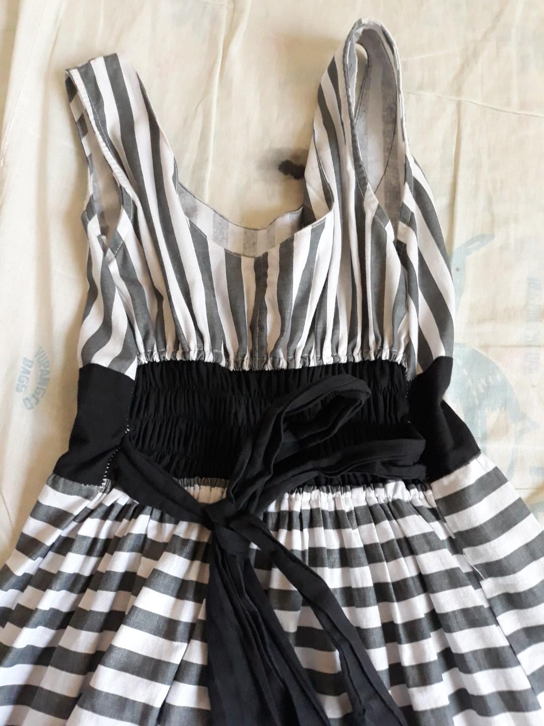 Gray and white casual stripe dress (Category: Dresses) located in Arayat. Submitted by mgf00 (Listing ID 229015318, Image 3). Description: USED TWICE Fits small - medium body size only Slightly stretchable No signs of usage 8/10 No flaw - stored only Please manage your expection as you are purchasing some preloved and some brand new but stored and has minor damage items. Thank you so much! Please be kind to the seller😊 Pm for more inquiries and 
