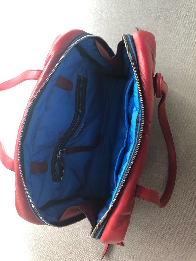 PRADA authentic (Category: Cross-body Bags) located in Singapore. Submitted by lcsw (Listing ID 220373262, Image 2). Description: AUTHENTIC Prada Bag Comes with Dust Bag, Authenticity Card. Selling $3k in retail shop. Self-collect from Punggol Drive.