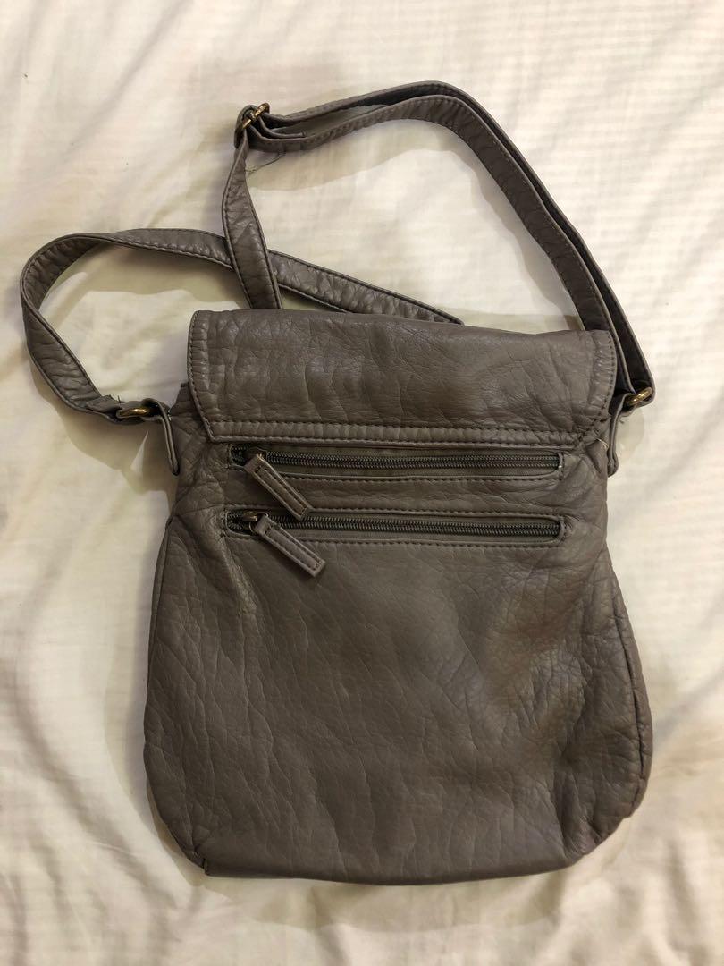 Gray leather bag (Category: Cross-body Bags) located in Pasig City. Submitted by seconds4pas (Listing ID 229348501, Image 2). Description: Decluttering .