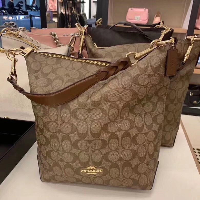 coach signature abby duffle