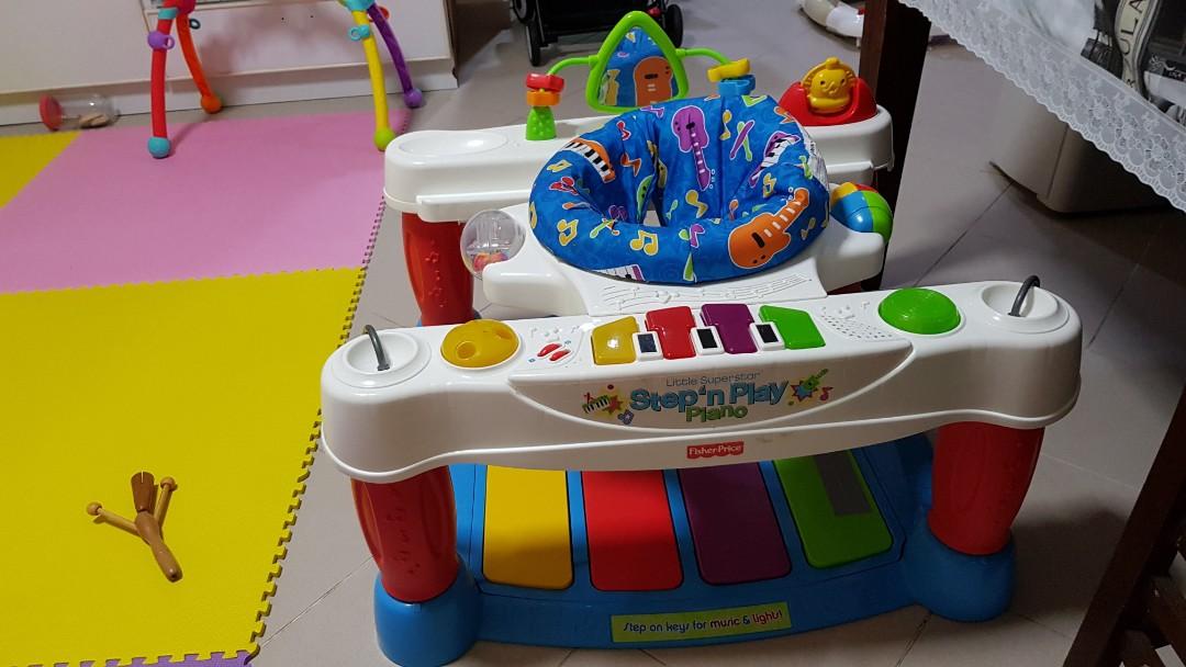 fisher price piano exersaucer