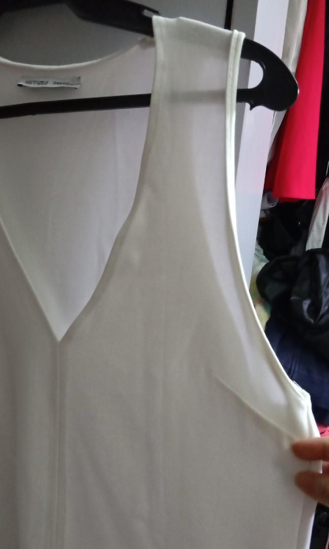 authentic Zara deep V sleeveless (Category: Sleeveless) located in Manila. Submitted by declutter_with_s (Listing ID 229711942, Image 3). Description: sexy deep v neck, white top for all OOTDs.. 😘.