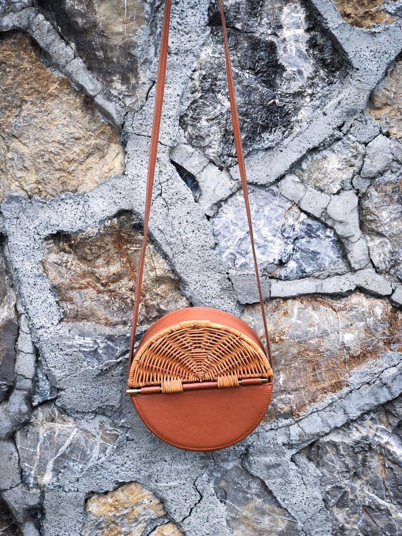 Heather Leather (leather/rattan bag) (Category: Cross-body Bags) located in Manila. Submitted by bug2017 (Listing ID 177303060, Image 1). Description: Genuine leather, rattan flap, magnetic closure. Diameter: 20 cm CLEARANCE SALE. Originally Php 2,499 #fdelivery.