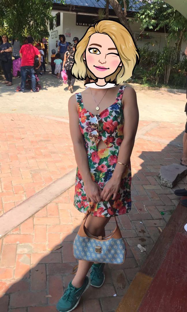 Floral cut out short dress (Category: Dresses) located in Cabuyao City. Submitted by bea112894 (Listing ID 229870042, Image 2). Description: It looks nice in real life I swear and make you look sexy with those cut out.