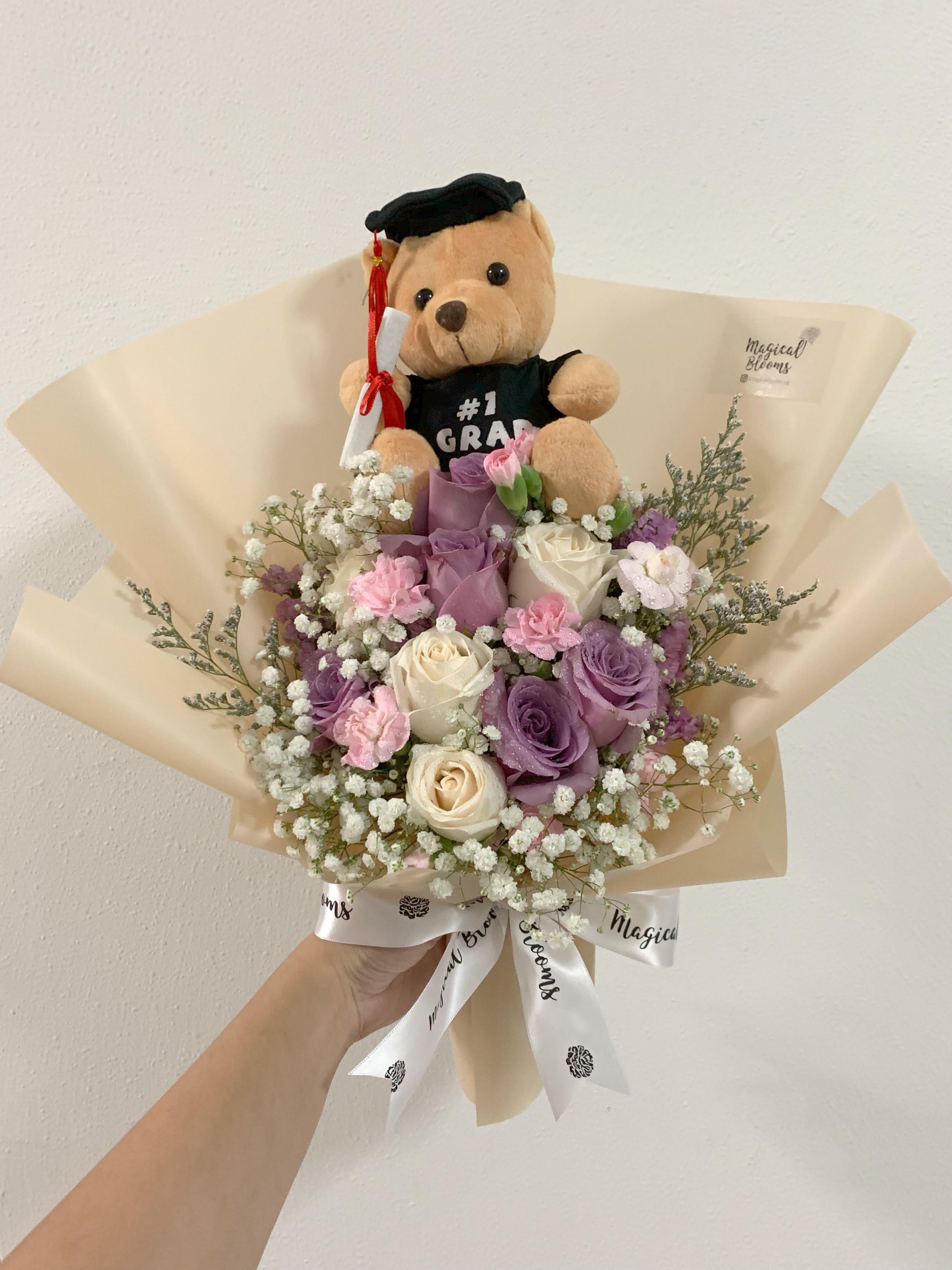 graduation flowers with bear