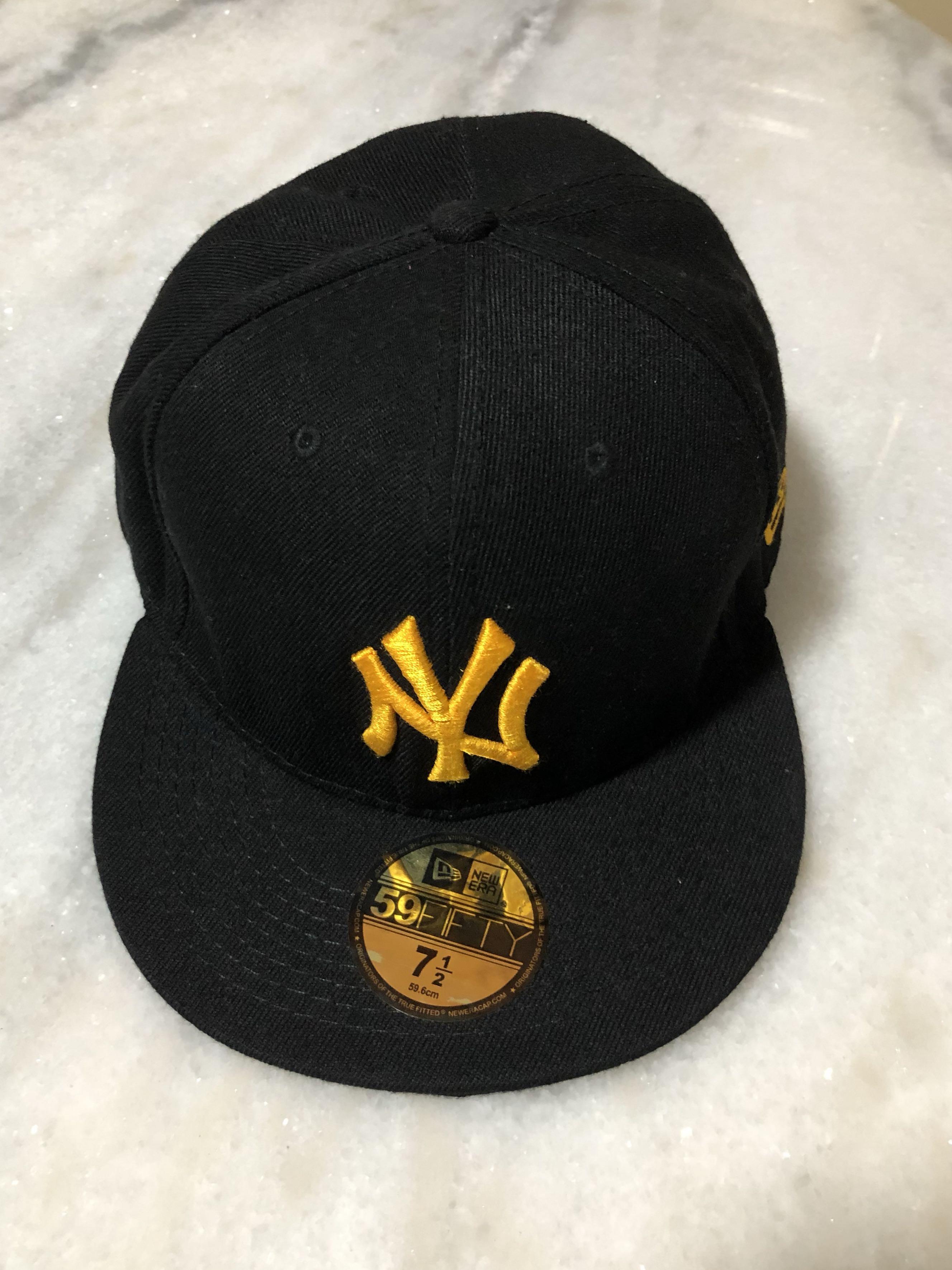 black and gold baseball cap