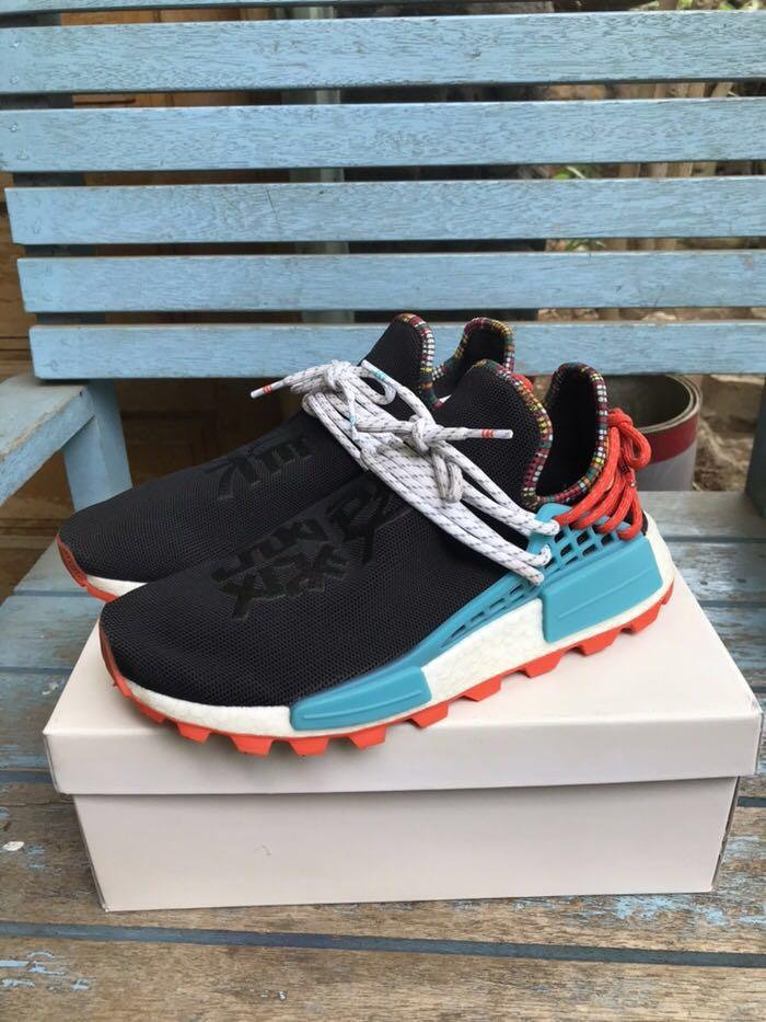 Reprice Sepatu Adidas Nmd Hu Solar X Pharell Williams Men S Fashion Men S Footwear Sneakers On Carousell