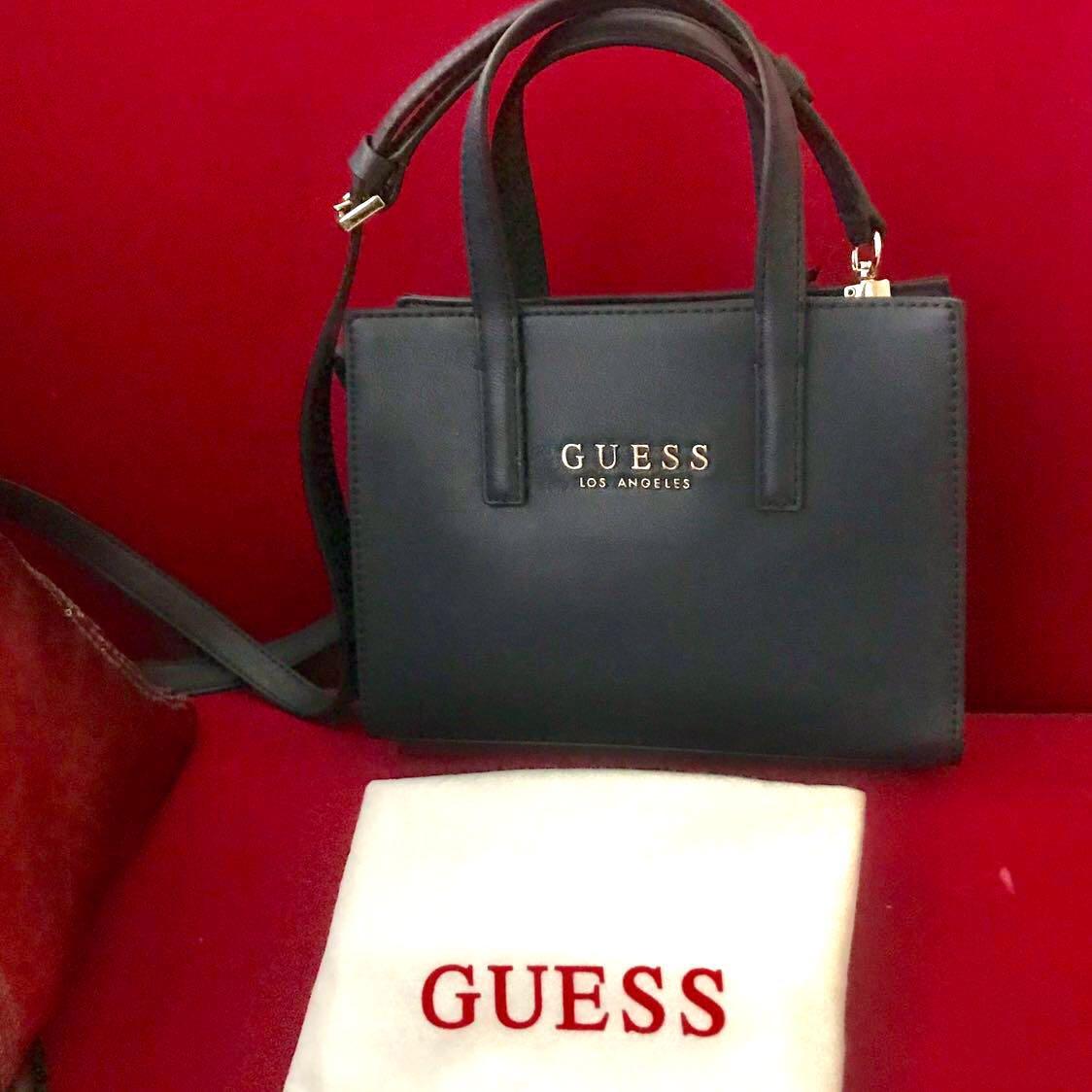guess navy handbag