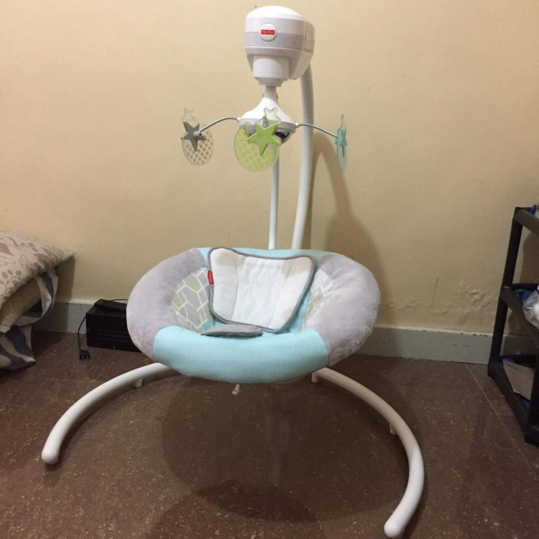 Fisher Price Electric Cradle and Swing (Category: Infant Playtime) located in Bacoor. Submitted by yunissy (Listing ID 230217166, Image 1). Description: Bought at Canda for P11,000.00 selling for P7,000.00 (negotiable for sure buyers) No issue Excellent used condition For pick up at Sm Molino.