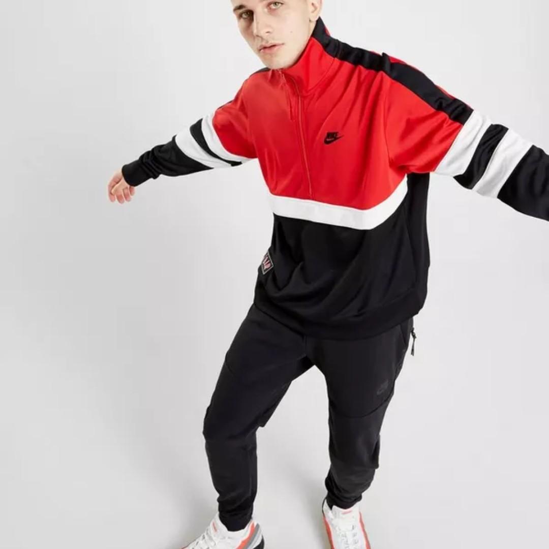 nike half zip track top