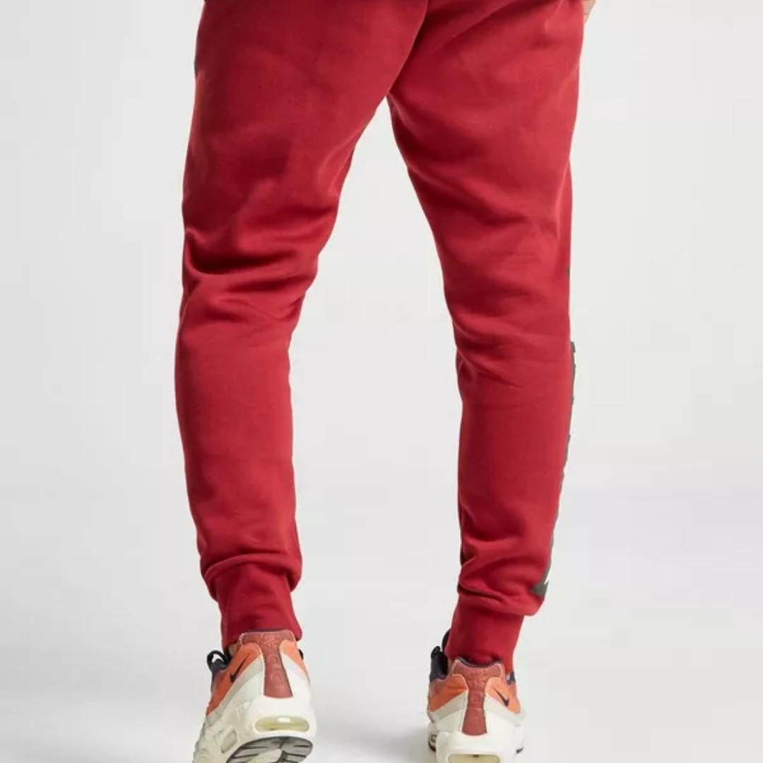 nike air leg logo track pants